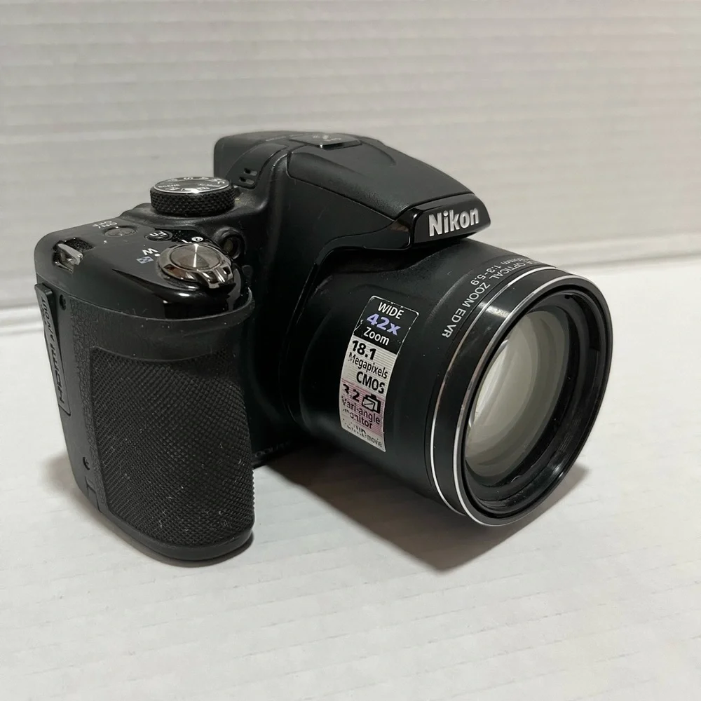 Black used untested Nikon, Coolpix 520